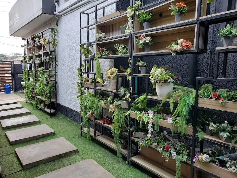 Papiee's Meatro pub exterior in Lagos - an Arsenal supporters' pub